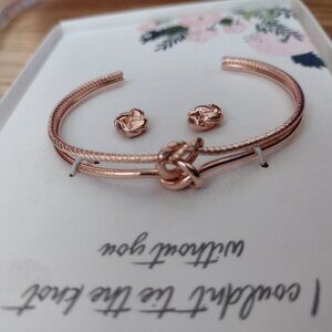 NIB bracelet with knot and matching earrings, rose color